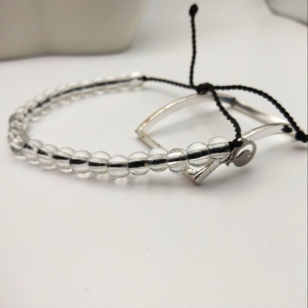 Ocean 40‎ Clear beaded on black thread bracelet